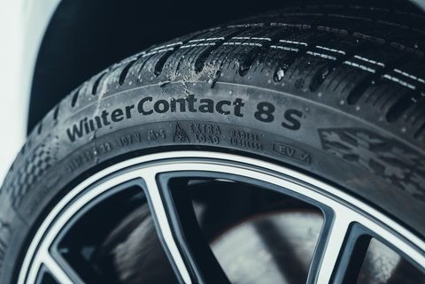 Close view of a winter tyre sidewall and tread edge