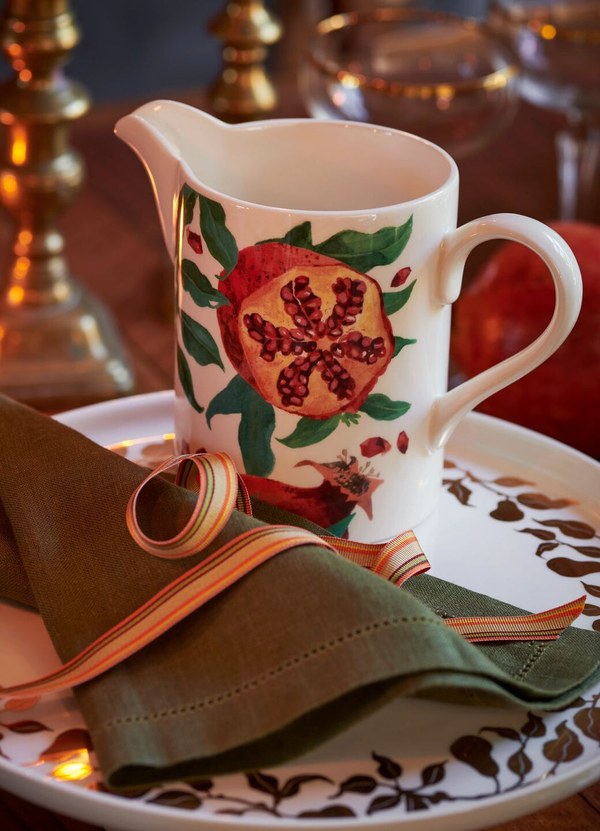 Emma Bridgewater Festive Pomegranate jug on a Christmas table