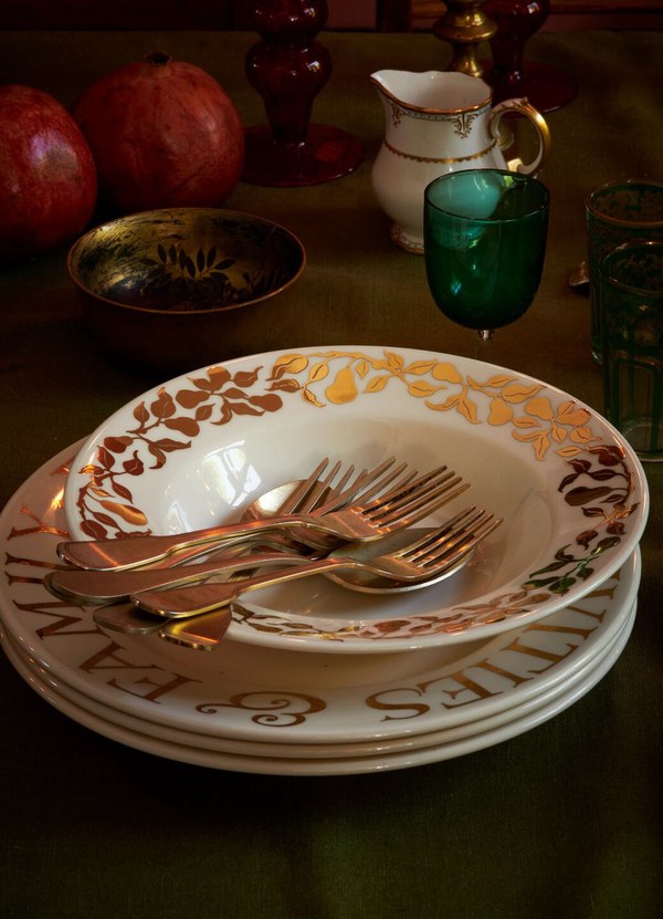 Stack of Emma Bridgewater Gold Pear Tree plates with a gold foliage border