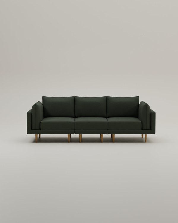 Livom Donna three-seater sofa in dark green with slim wooden legs