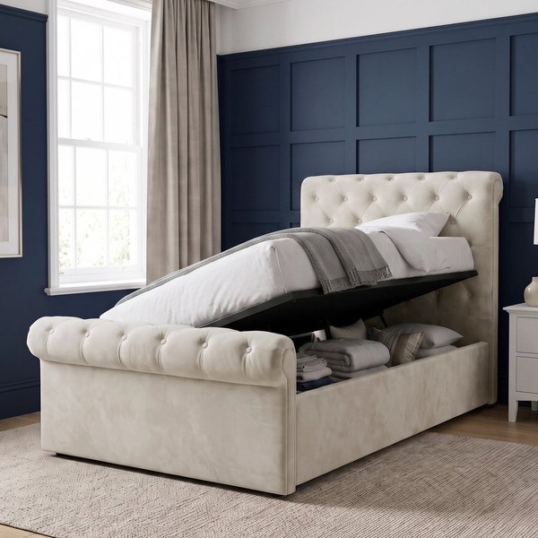 Cream velvet Chesterfield ottoman bed with the base lifted from the side to reveal storage