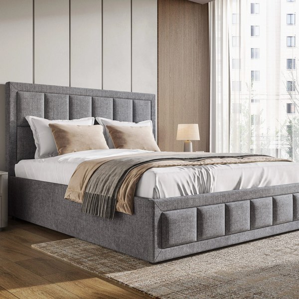 End-Lift or Side-Lift? A Buyer’s Guide to Ottoman Storage Beds Grey linen ottoman storage bed with a square panelled headboard in a styled bedroom
