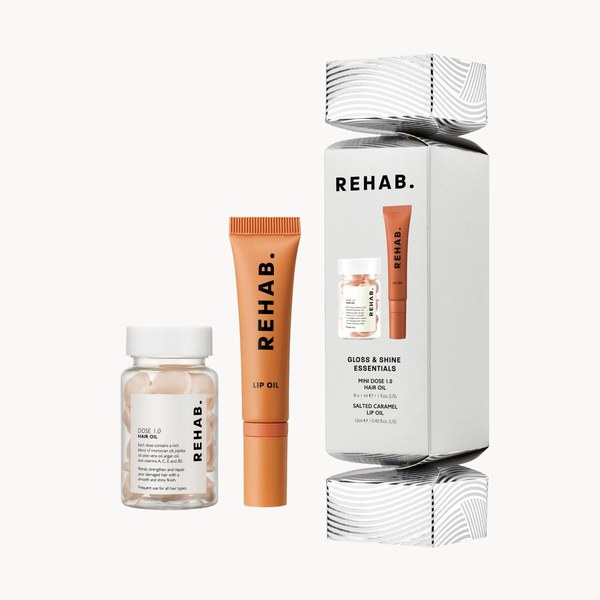 REHAB. Gloss and Shine Essentials Christmas Cracker Kit with a mini hair oil and lip oil