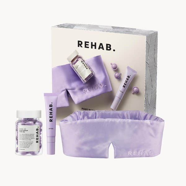 REHAB. Post Party Sleep Set with a lilac silk sleep mask, hair oil and lip product