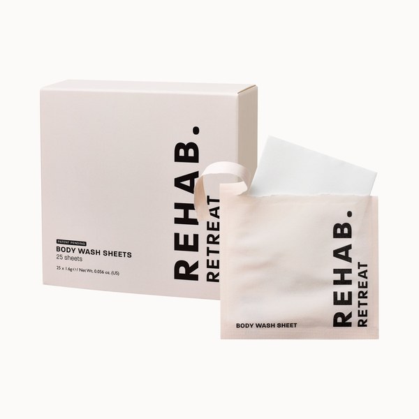 REHAB. Retreat Body Wash Sheets box with a sheet and pouch
