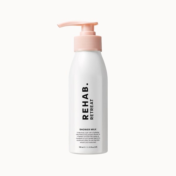 White REHAB. Retreat Bath and Shower Milk bottle with a pump