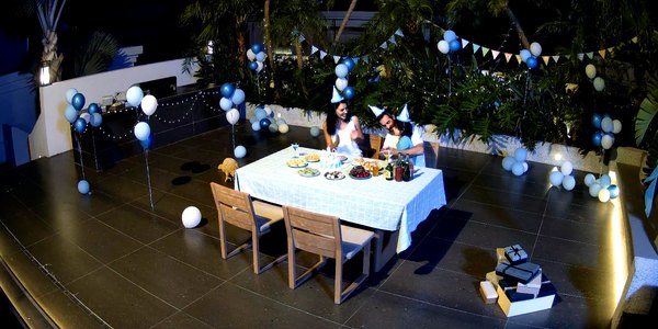 Garden scene at night captured in colour by a Reolink camera