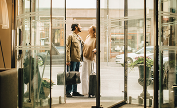 Guests arriving at a hotel with reserved parking