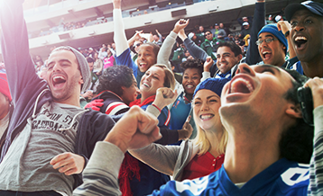 Fans at a stadium event with pre-booked SpotHero parking